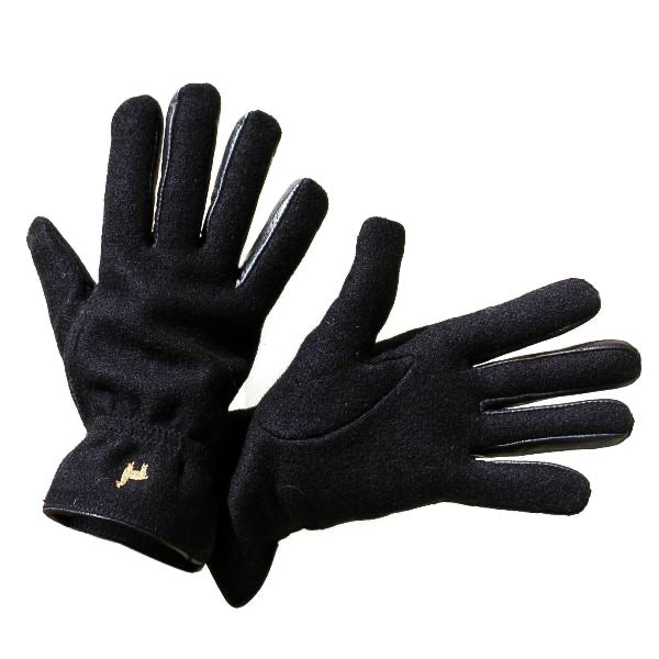 Two felted black alpaca gloves on a white background