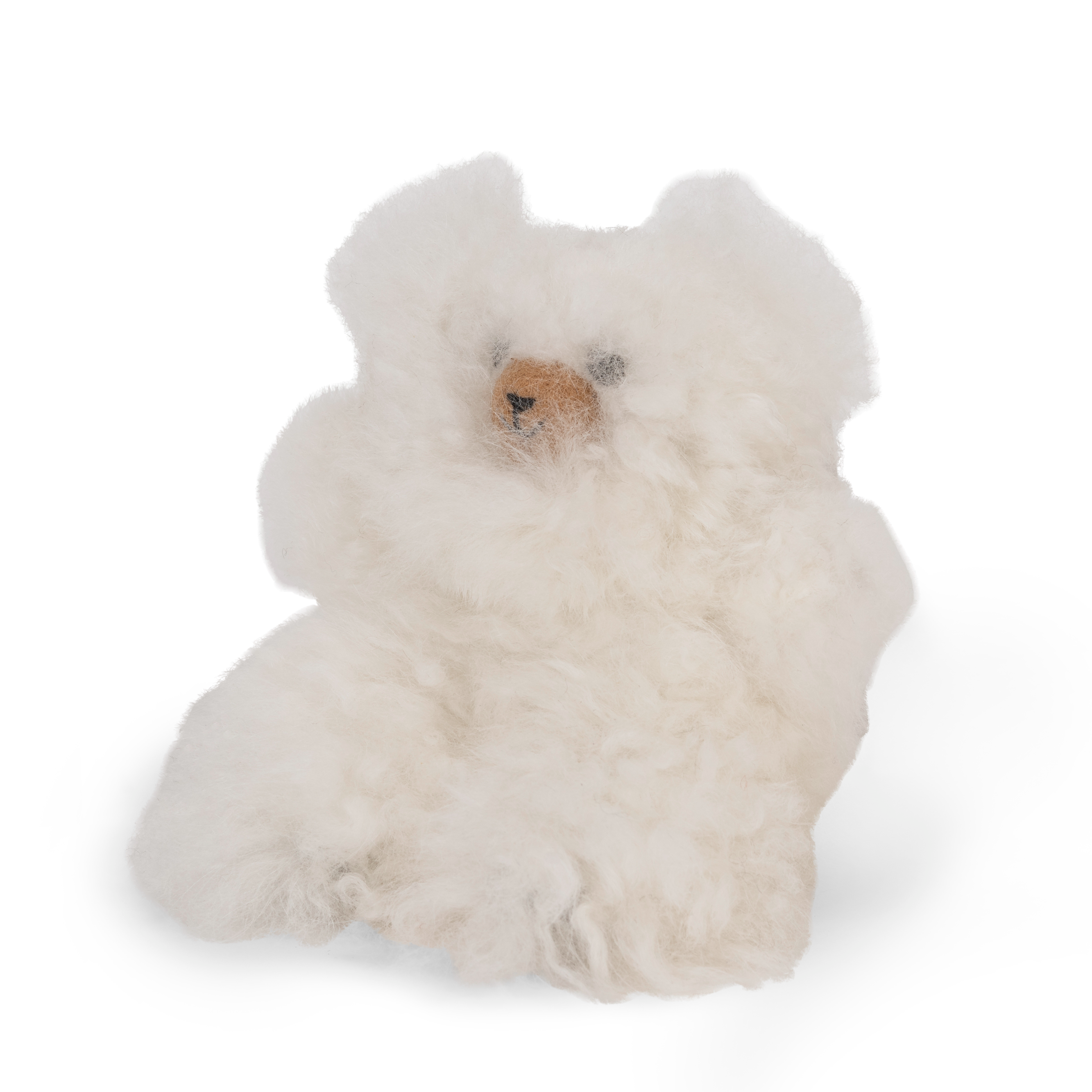 Plush bear toy with a white fur texture on a white background