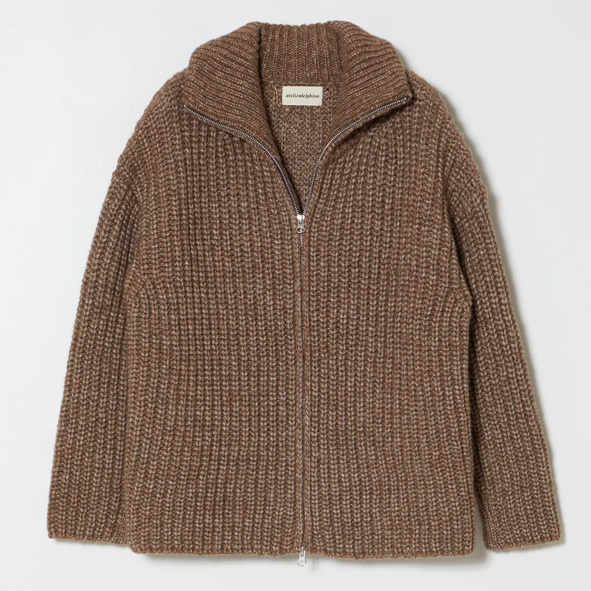 Ribbed knit zip up cardigan with turtleneck in brown on a neutral background.