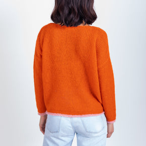 orange v neck baby alpaca long sleeve sweater modeled back view