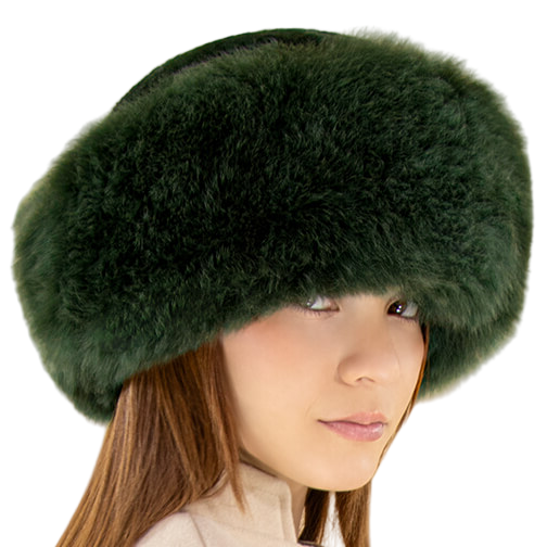 Person wearing a green fur hat with a beige background.