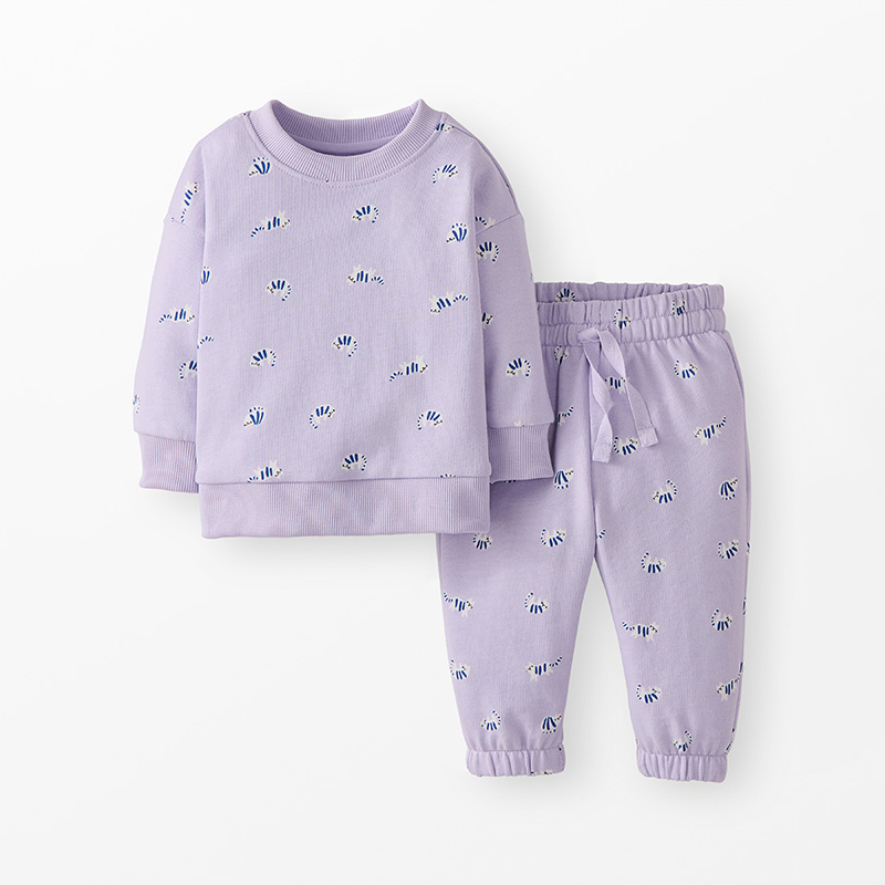 Lavender children's pajama set with small cat patterns on a white background