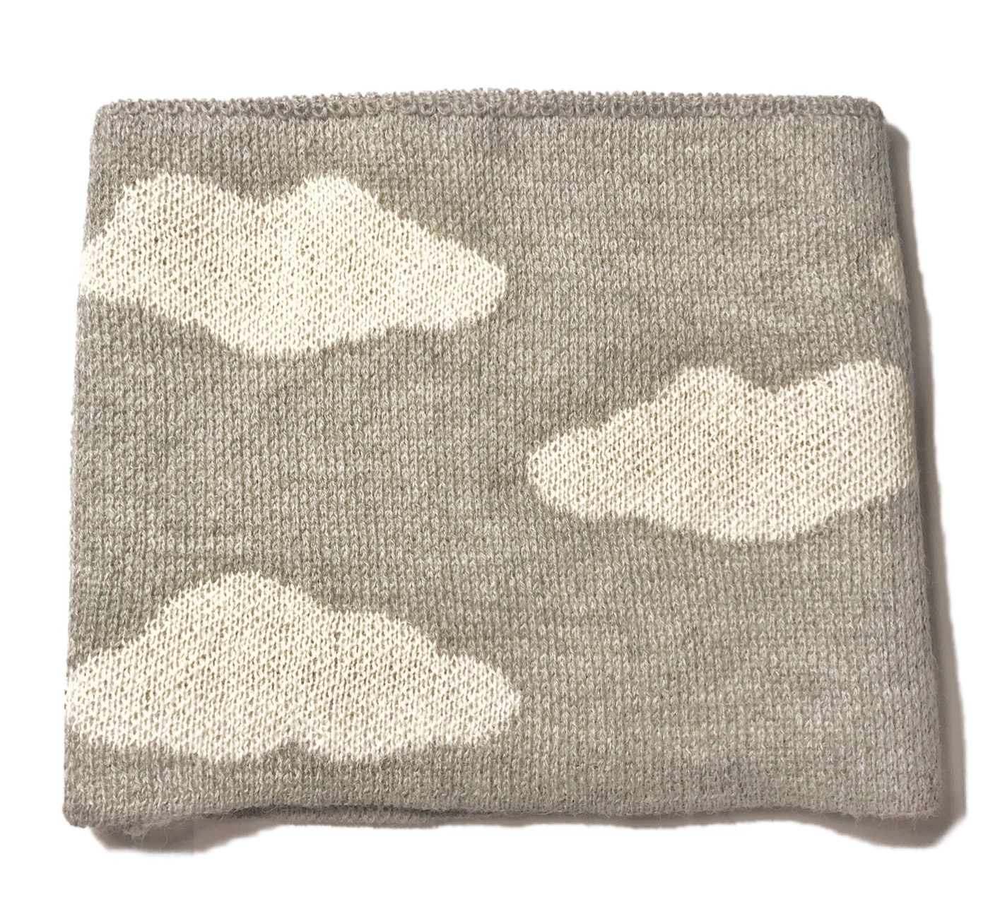 Gray knit neck warmer with cloud pattern on a white background