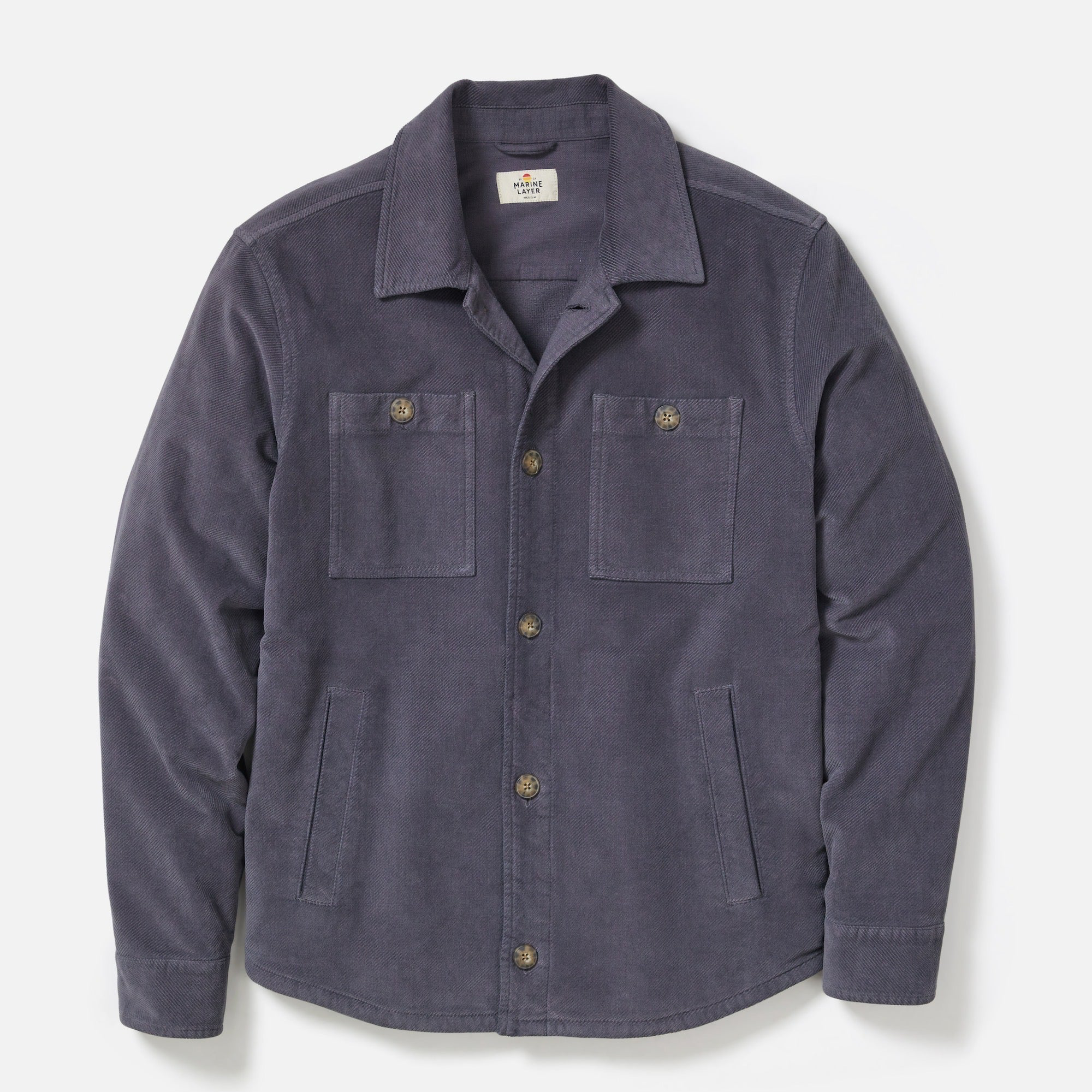 Navy blue jacket with button details on a light gray background