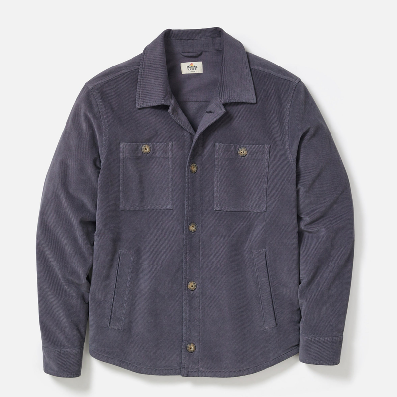 Navy blue jacket with button details on a light gray background