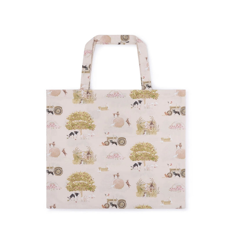 Tote bag with vintage tractor and farm pattern on a white background