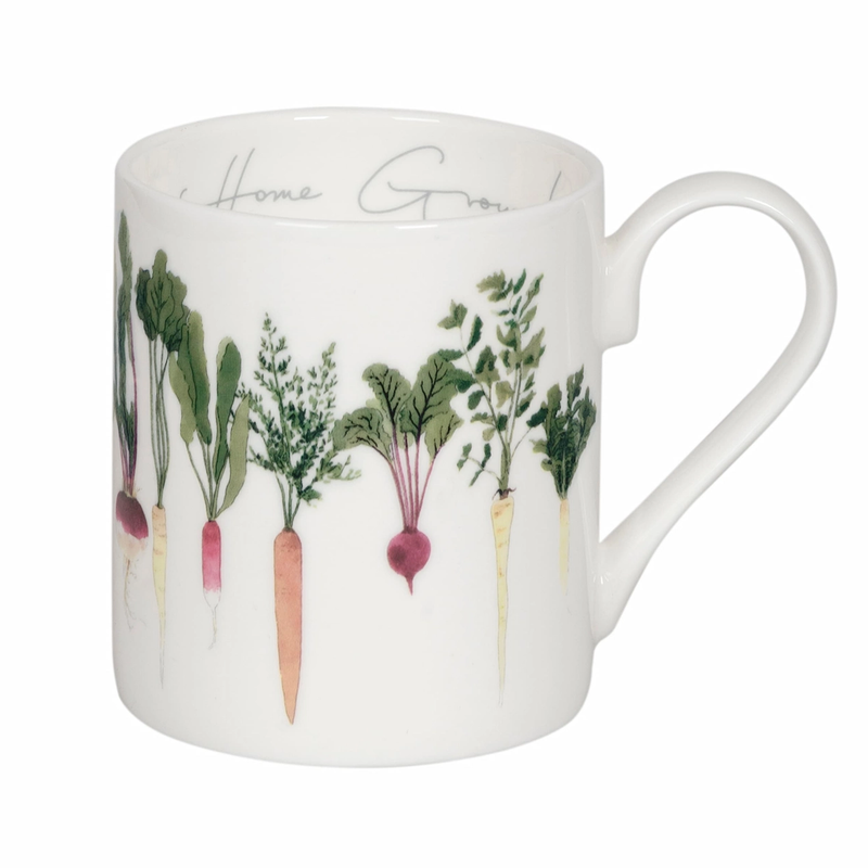 White mug with illustrations of vegetables and 'Home Grown' text on a white background