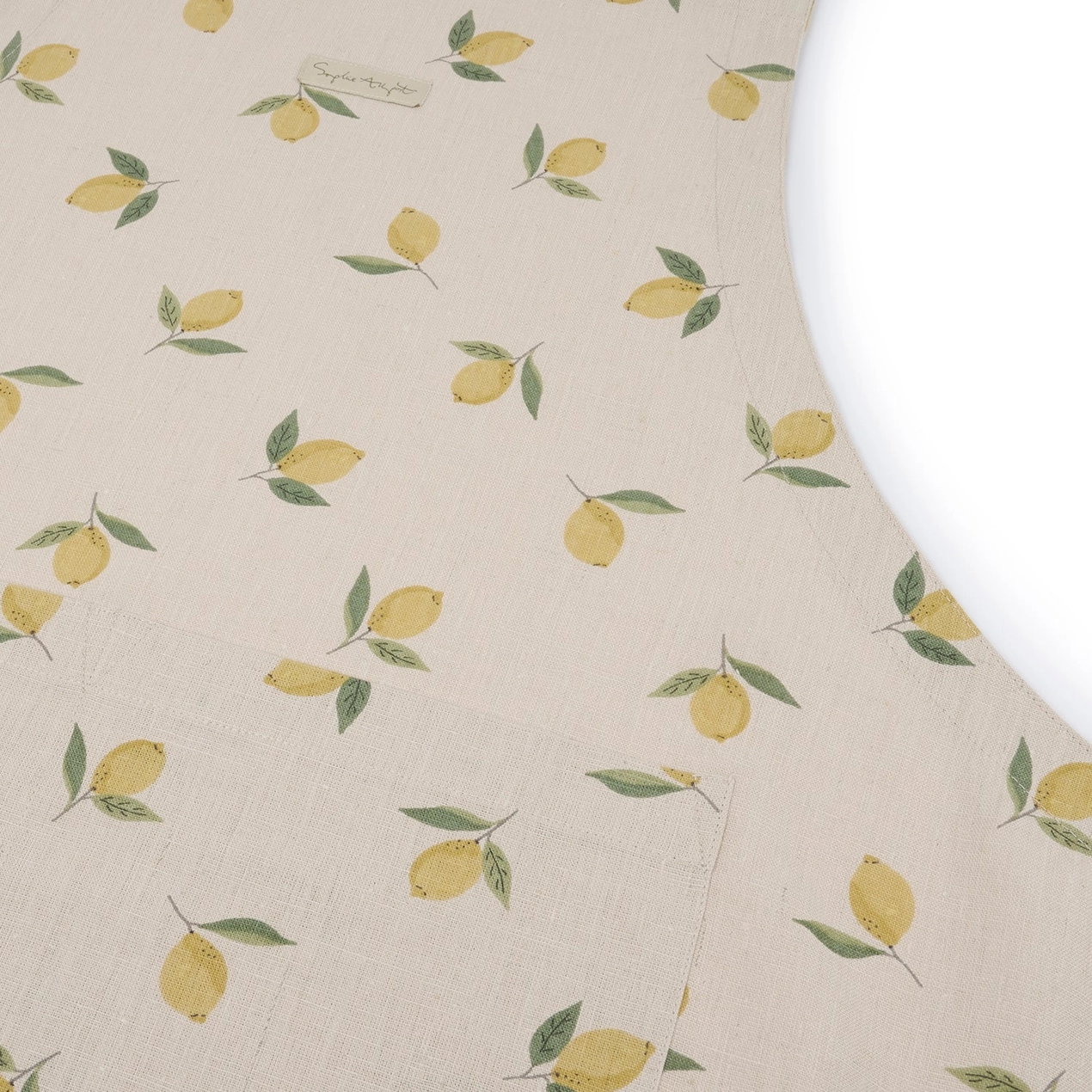 Aprom with lemon pattern on a beige background