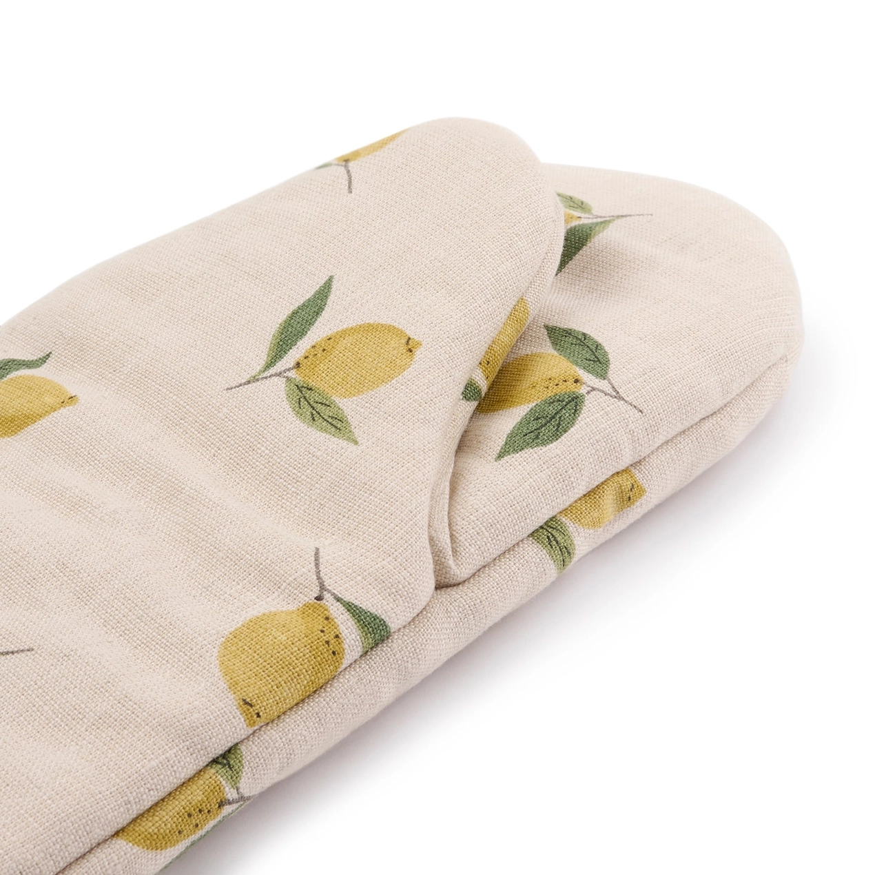 Beige oven mitt with lemon pattern on a white background