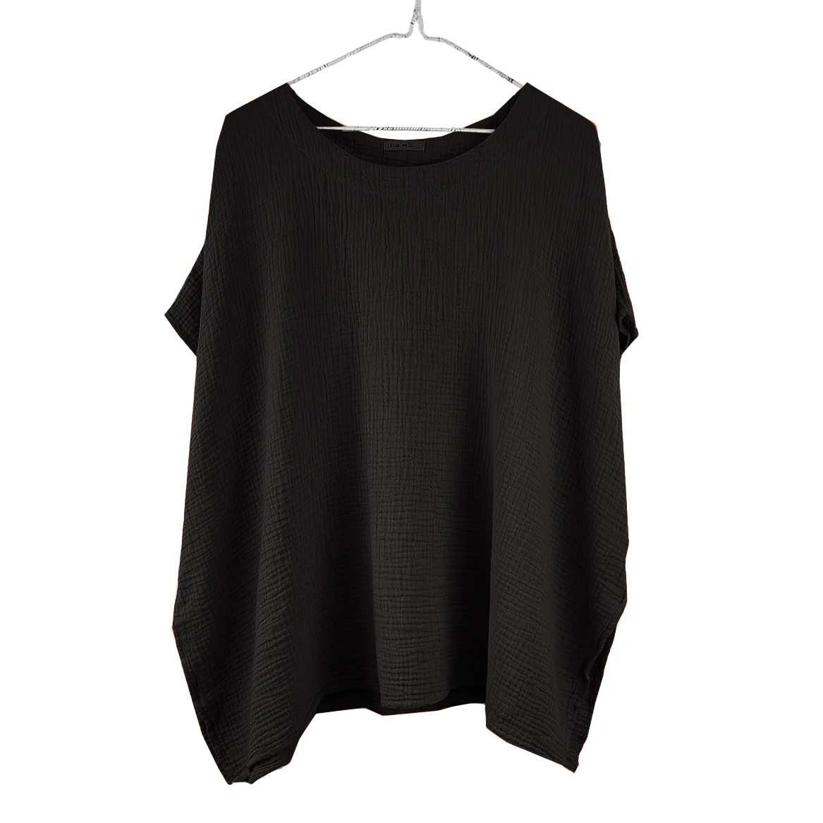 Black drapey top on a hanger against a white background