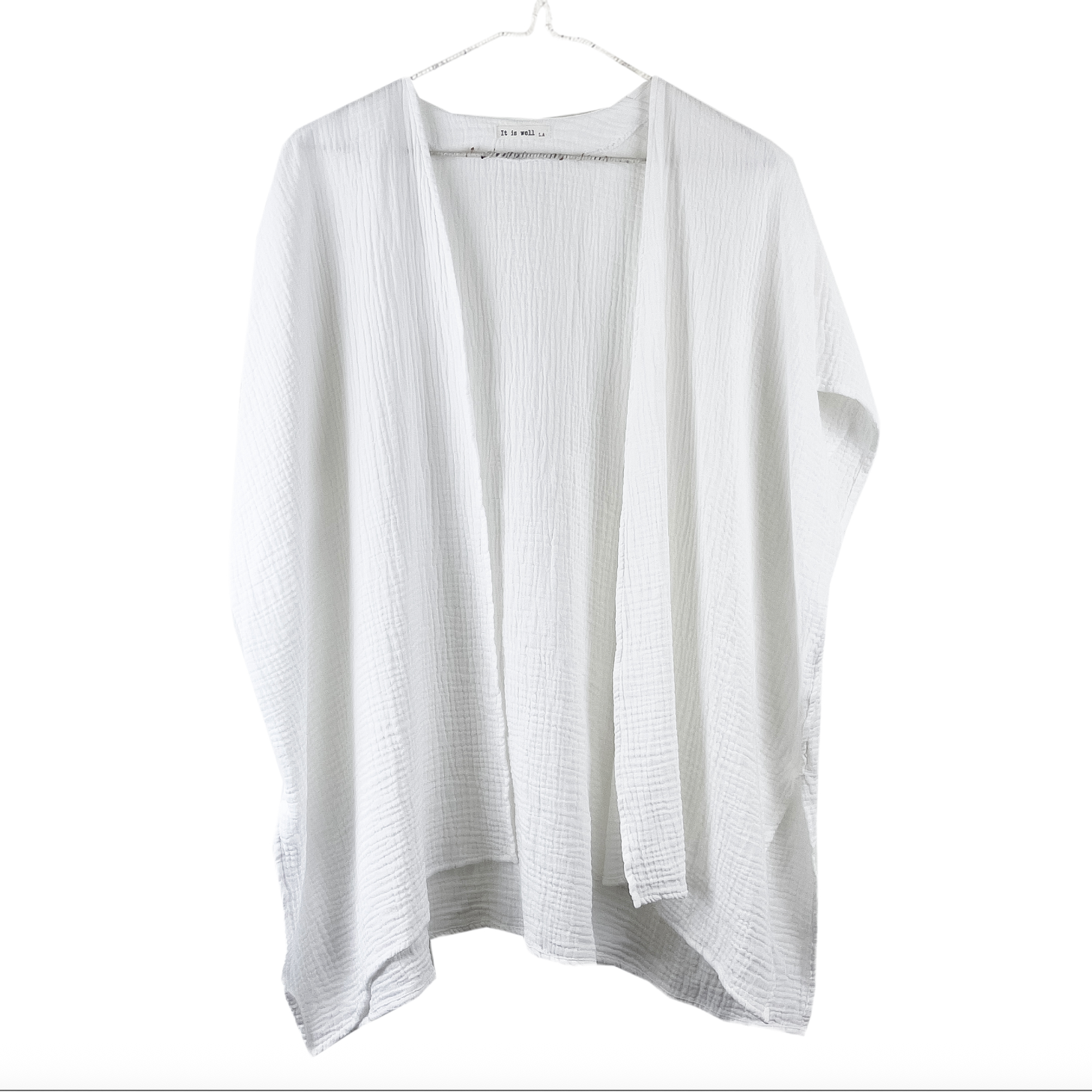 White cardigan on a white background