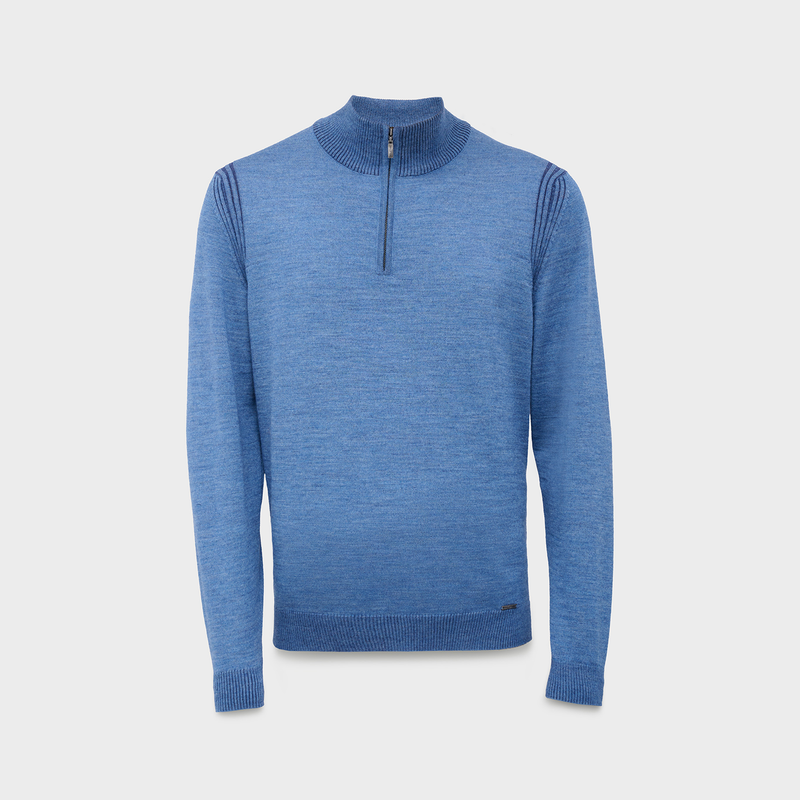 Blue sweater with a quarter zip on a light gray background