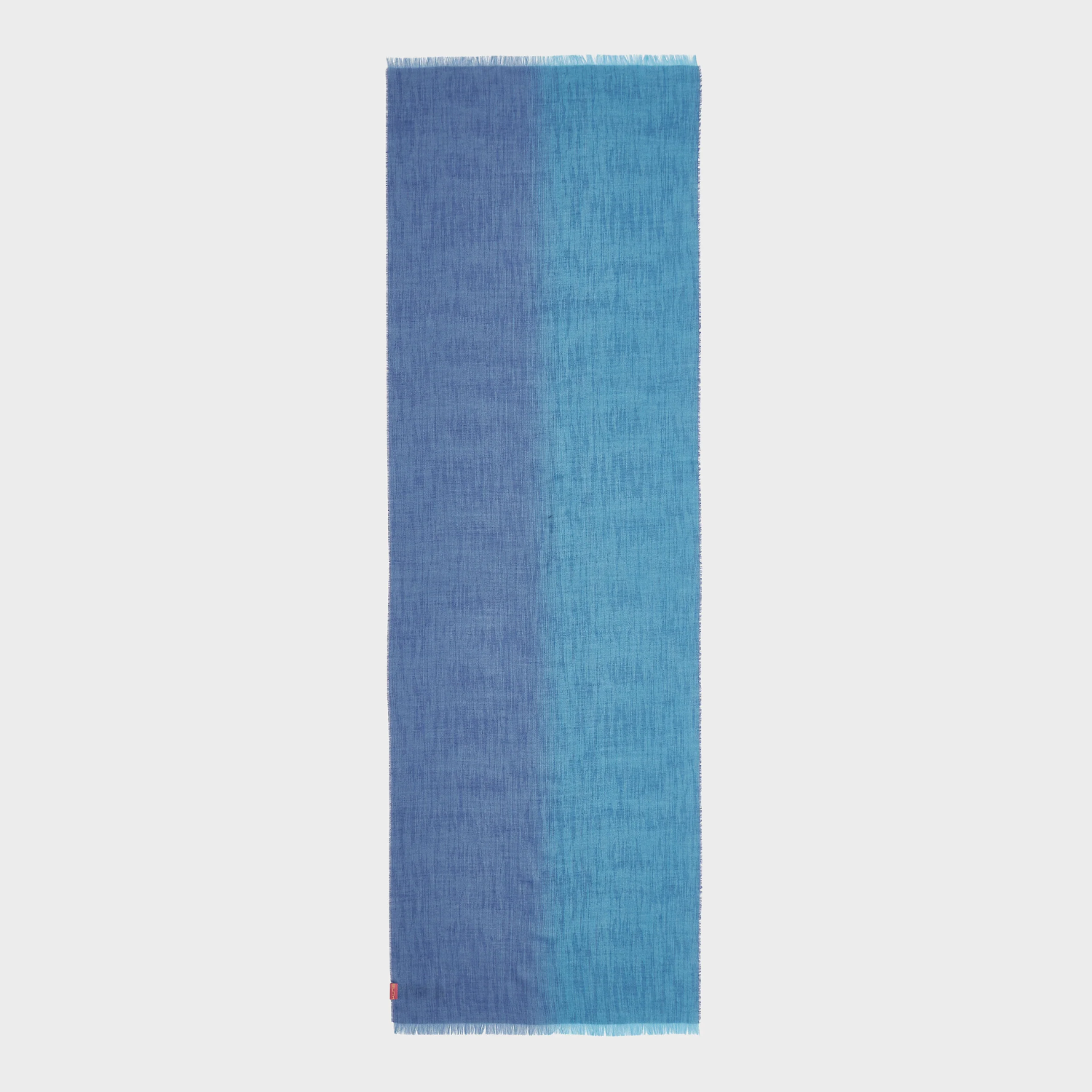 Gradient blue shawl on a light gray background
