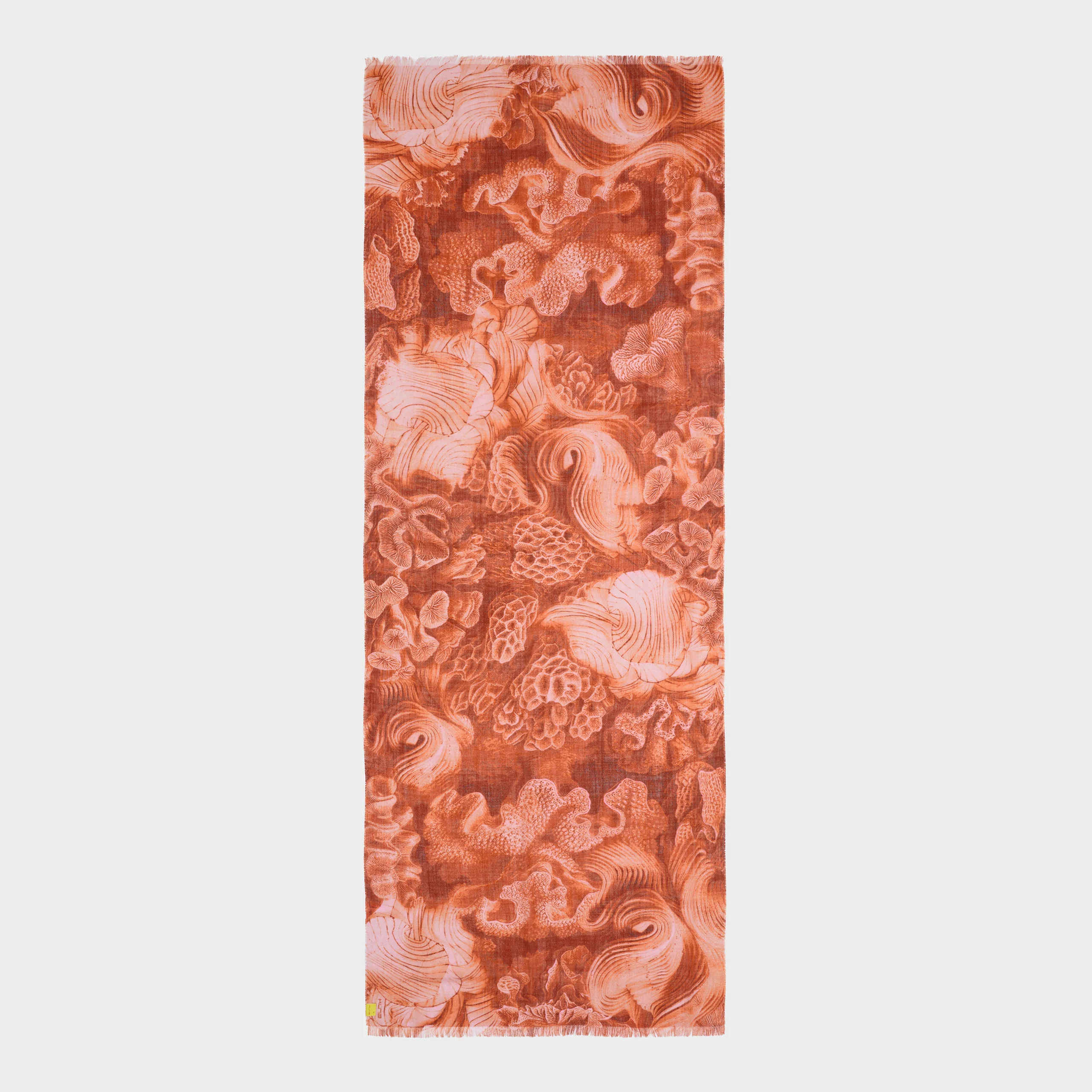 Shawl with a abstract orange pattern on a white background