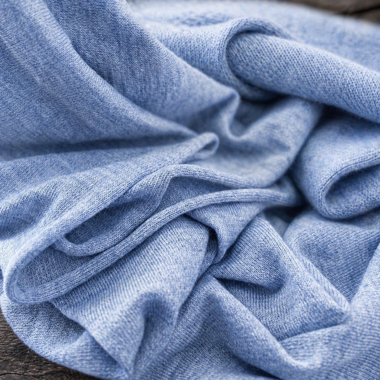 Close-up of blue travel wrap with a soft texture