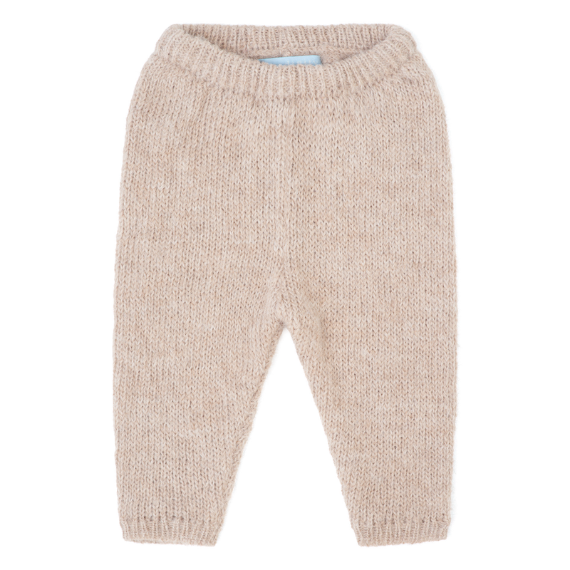A pair of beige knit baby pants with a ribbed waistband and ankle cuffs, shown flat on a white background.