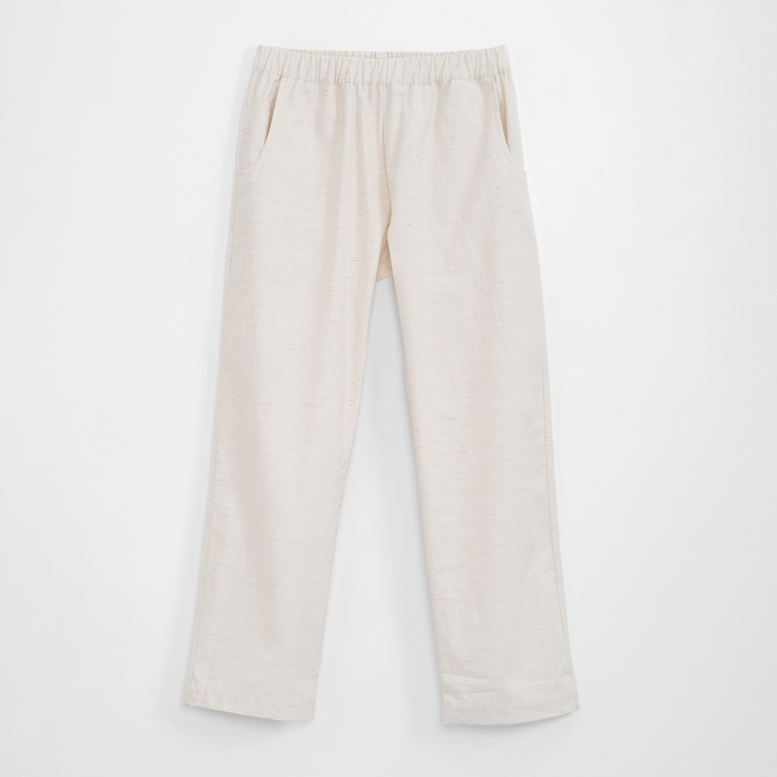Off white pants on a white background