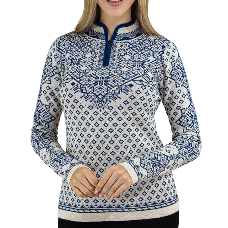 Woman wearing a blue and white patterned long-sleeve shirt on a white background