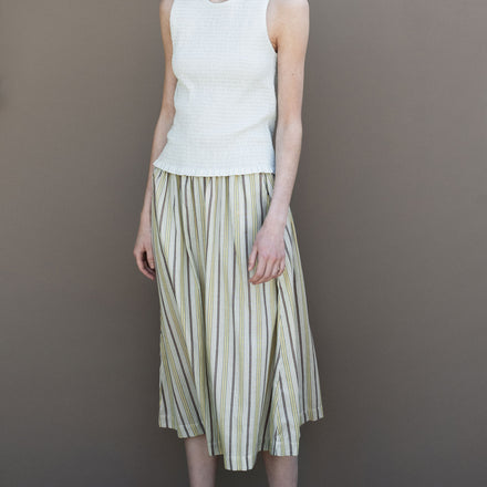 Serendipity Misty Stripes Cotton Skirt - 100% Organic Cotton, a whoman wearing a white top and a multicolored skirt