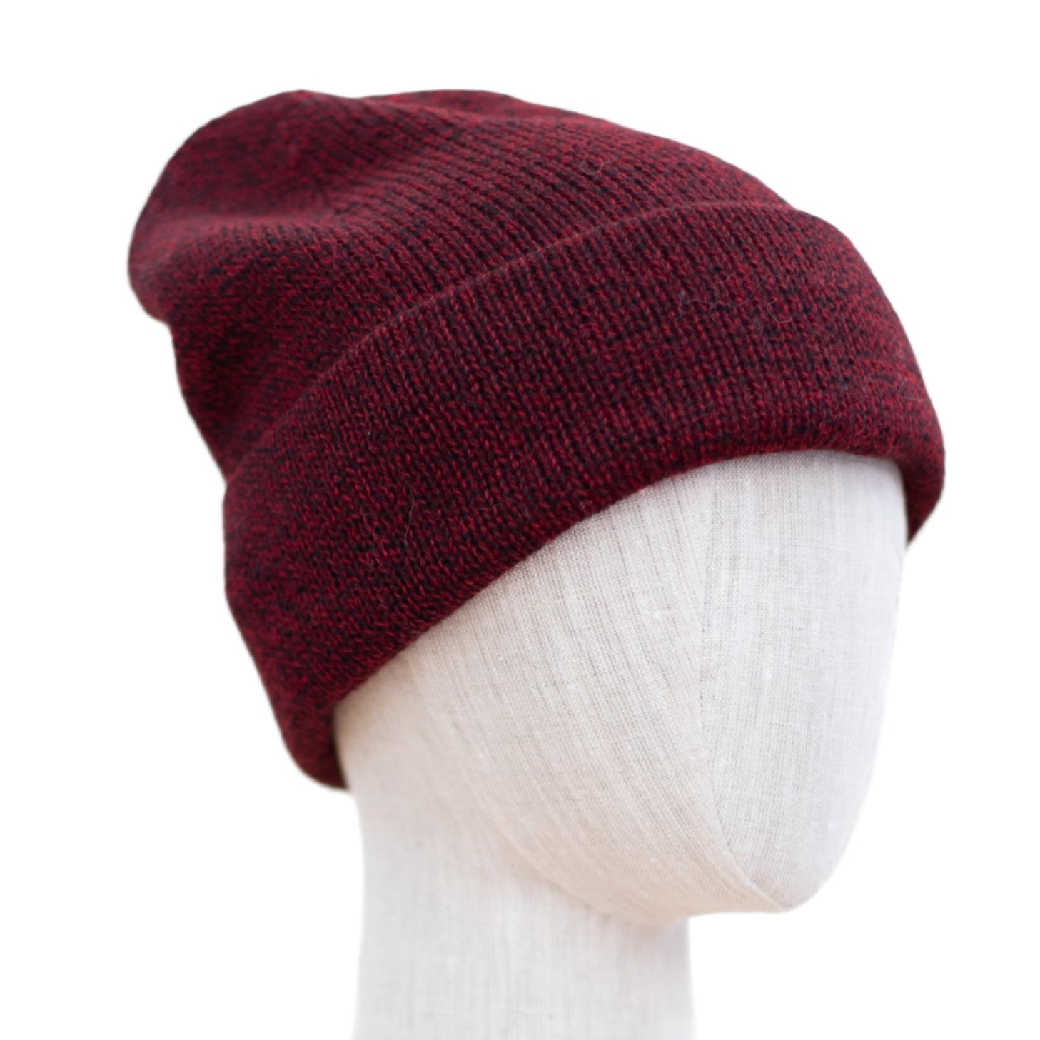 A red Molinet Baby Alpaca hat displayed on a mannequin head.