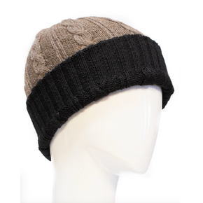 Two-tone knit beanie in brown and black on a mannequin head against a white background