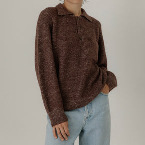 Bare Knitwear Alder Henley - person wearing marbled burgundy polo sweater on a neutral background