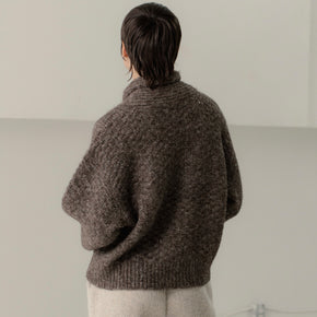 Bare Knitwear Bowen Shawl Cardigan - person wearing a marble brown button down cardigan on a neutral background