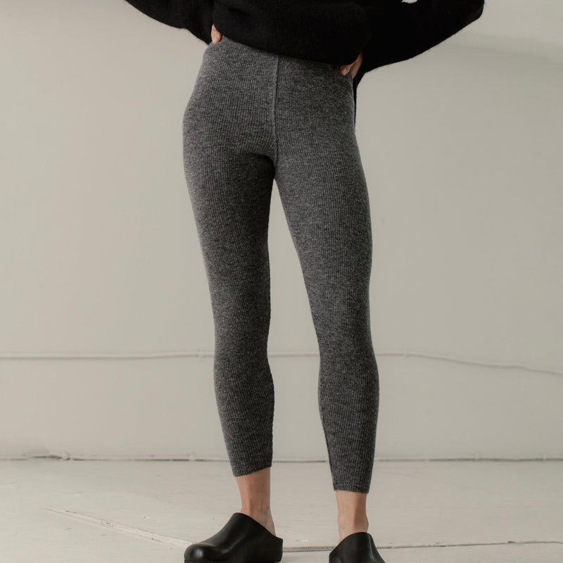 Bare Knitwear Marin Rib Tight - person wearing grey tights on a neutral background
