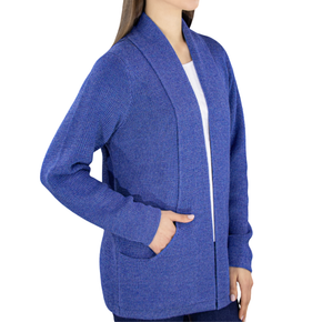 Blue cardigan worn by a person on a white background