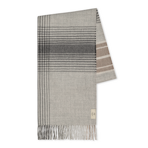 Plaid scarf with fringe on a white background