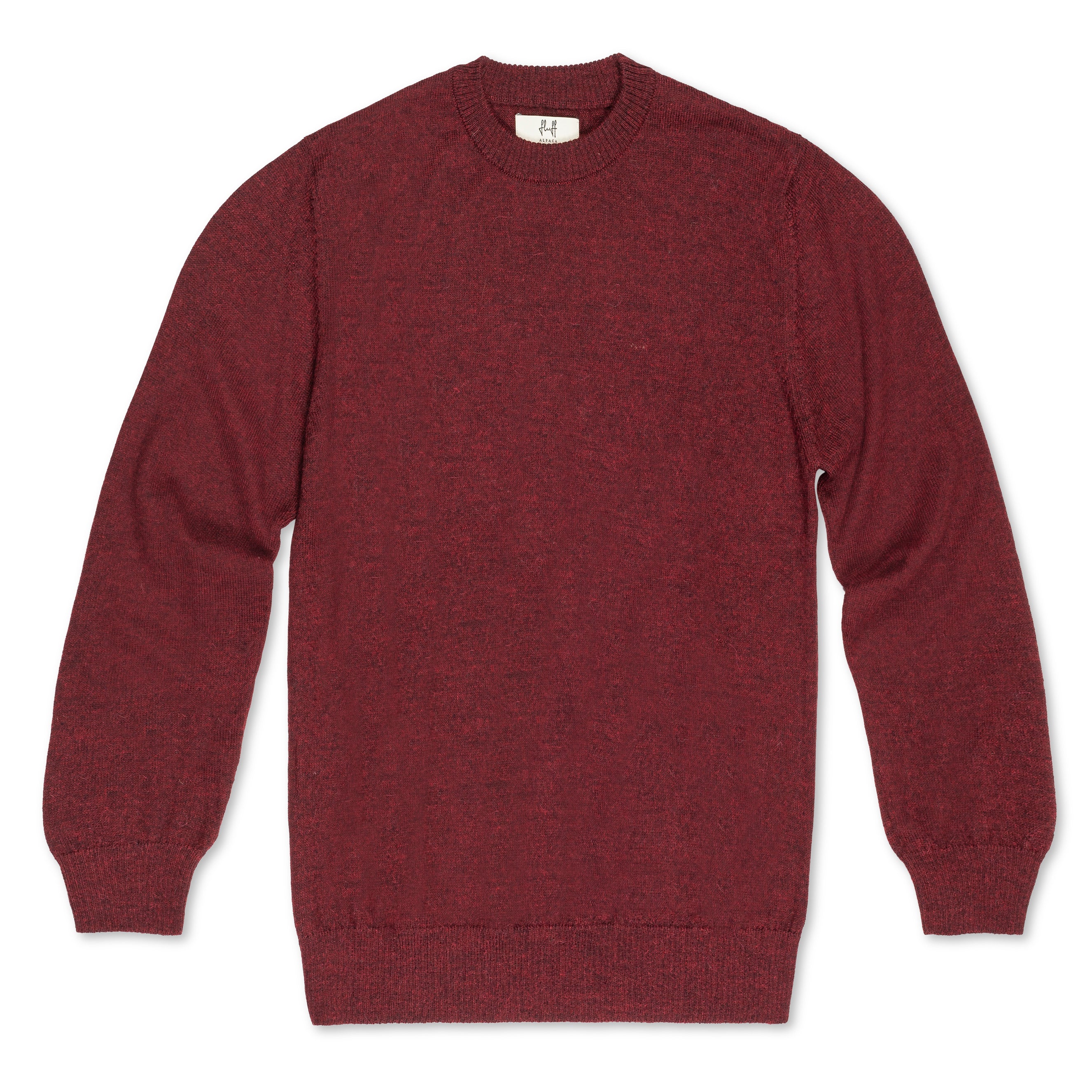 Men's Classic Crewneck 100% Baby Alpaca Sweater. A red 100% baby alpaca crewneck sweater lying flat on a white background. 