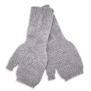 Gray knitted wrist warmers on a white background