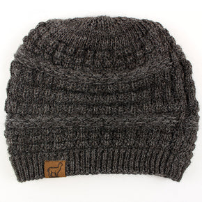 A gray textured alpaca slouch beanie with a small alpaca logo on the front.