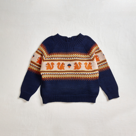 Oeuf Kid's Fair Isle Sweater - blue, orange, and white sweater with squirrel pattern on neutral background