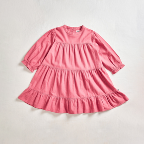 Oeuf Tiered Dress - pink ruffled dress on a neutral background
