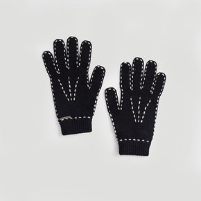 Kuna Willa Alpaca Gloves - black gloves with white stitching on a neutral background