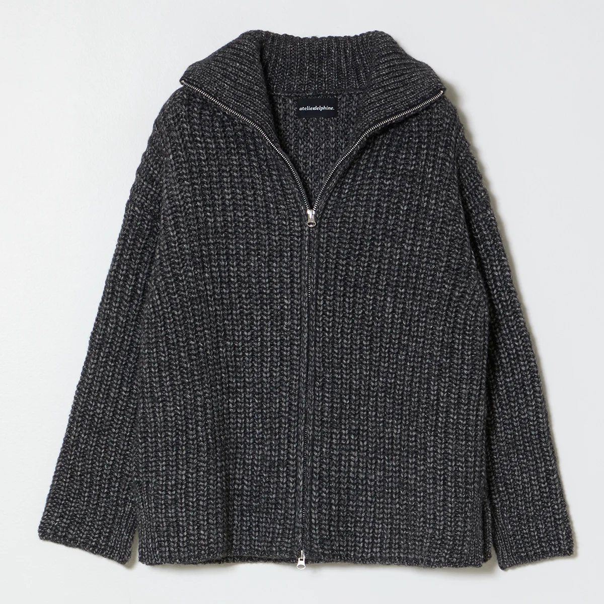 Charcoal grey ribbed knit turtleneck zip-up cardigan on a neutral background.