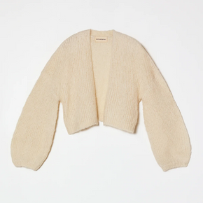 Cream ribbed knit cardigan on a white background