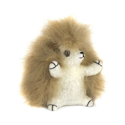 Plush toy hedgehog on a white background