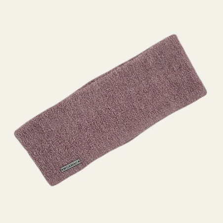 Pink headband on a light beige background