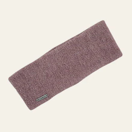 Pink headband on a light beige background