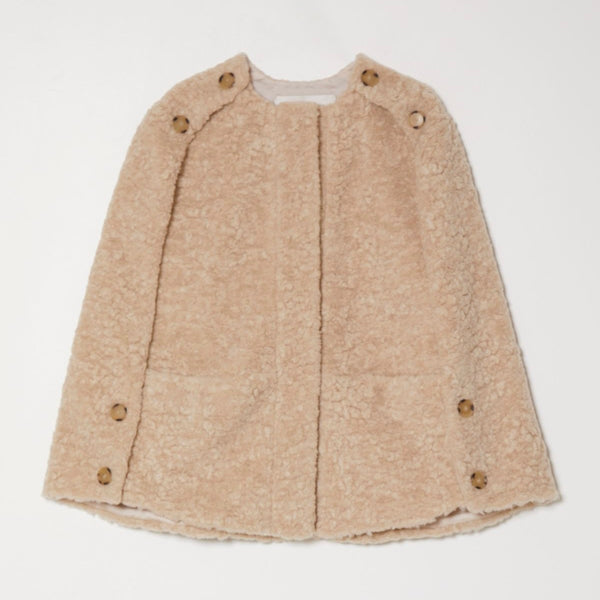 Atelier Delphine Bea Vest - light beige vest with front pockets and buttons on shoulders and sides on neutral background
