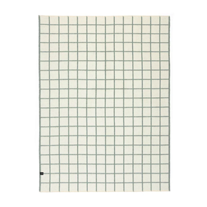 Grid-patterned blanket with black lines on a white background