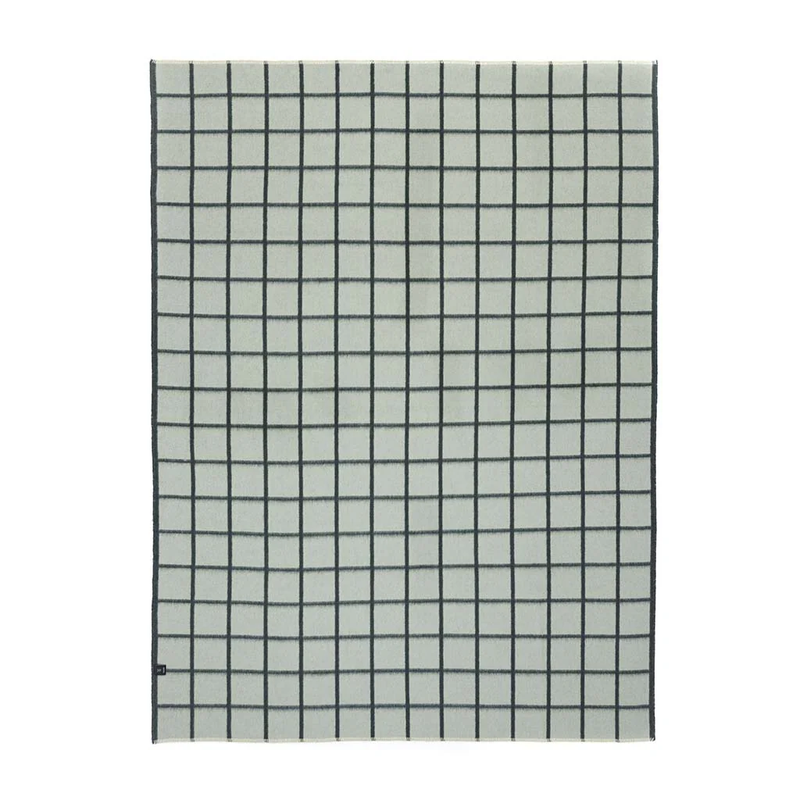 Grid patterned blanket on a white background