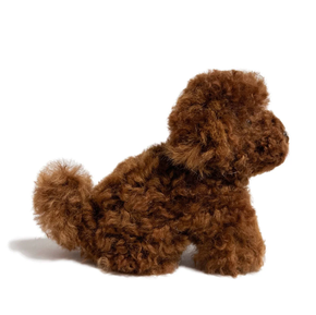 Brown plush dog toy on a white background