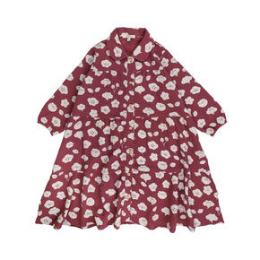 Red Caribou Children's Muslin Dress - dark red muslin dress with long sleeves, tiered skirt, buttons, and floral print on a neutral background