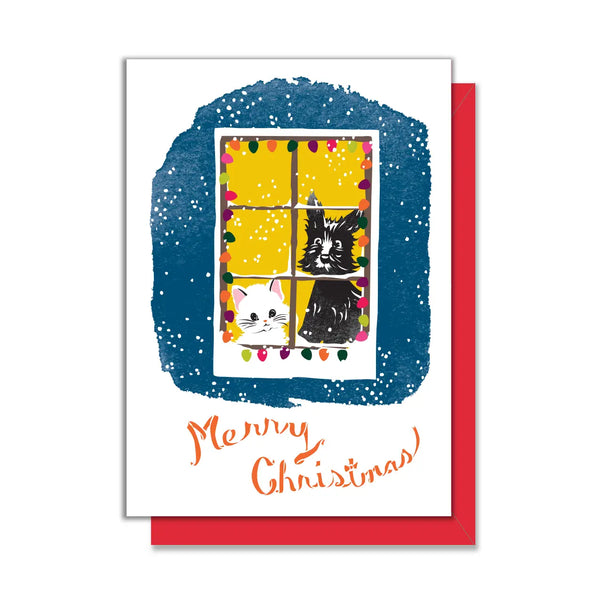Dog & Cat Christmas Mini Enclosure Card - ab lack dog and white cat look out a window surrounded by christmas lights as it snows. Blue wall on a neutral background 