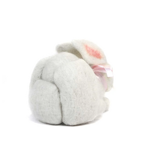 Plush felted bunny toy with pink accents on a white background