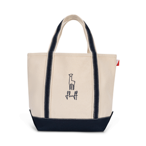 Off white tote bag with navy accents and 'fluff' logo on a white background