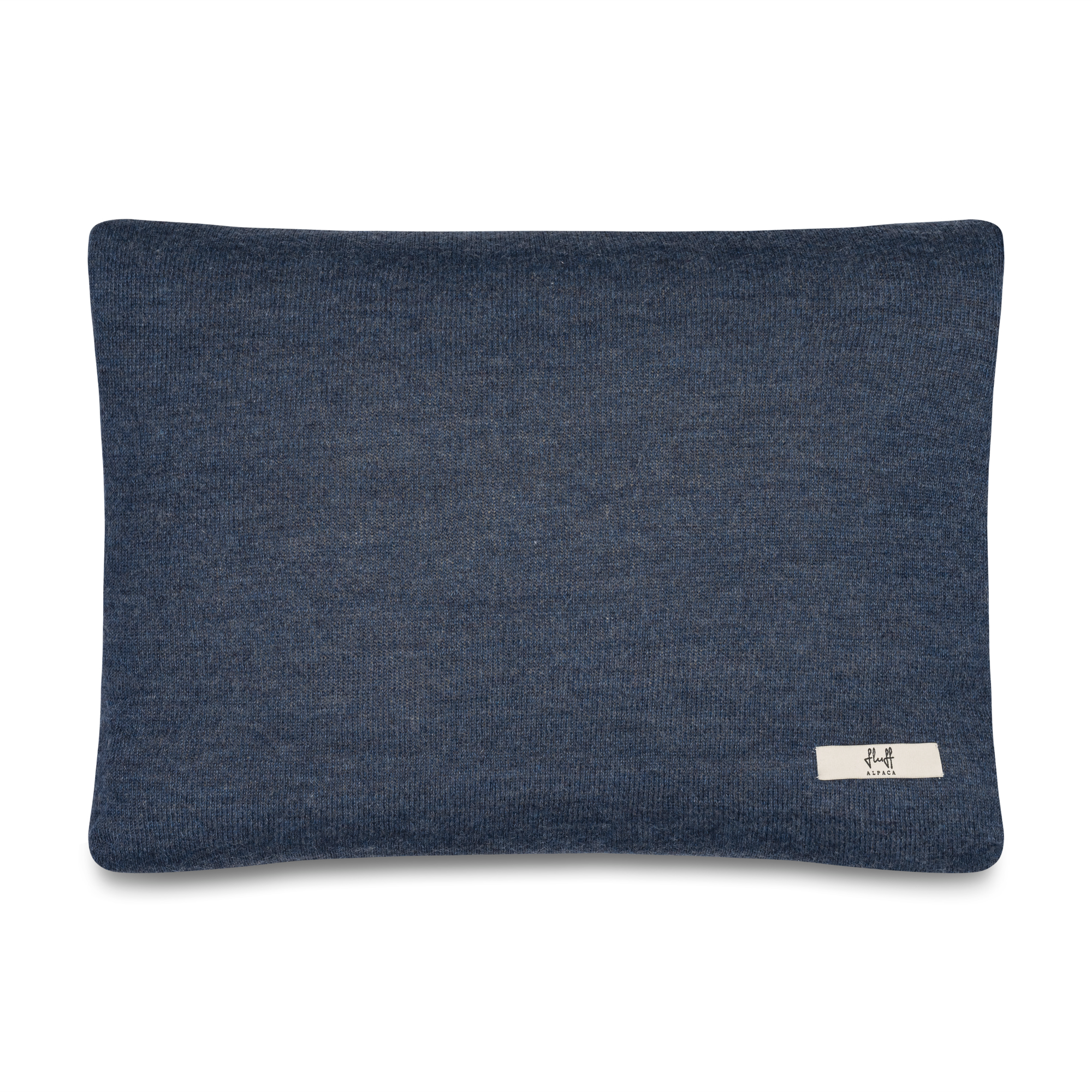 Blue textured pillow with a brand label on a white background